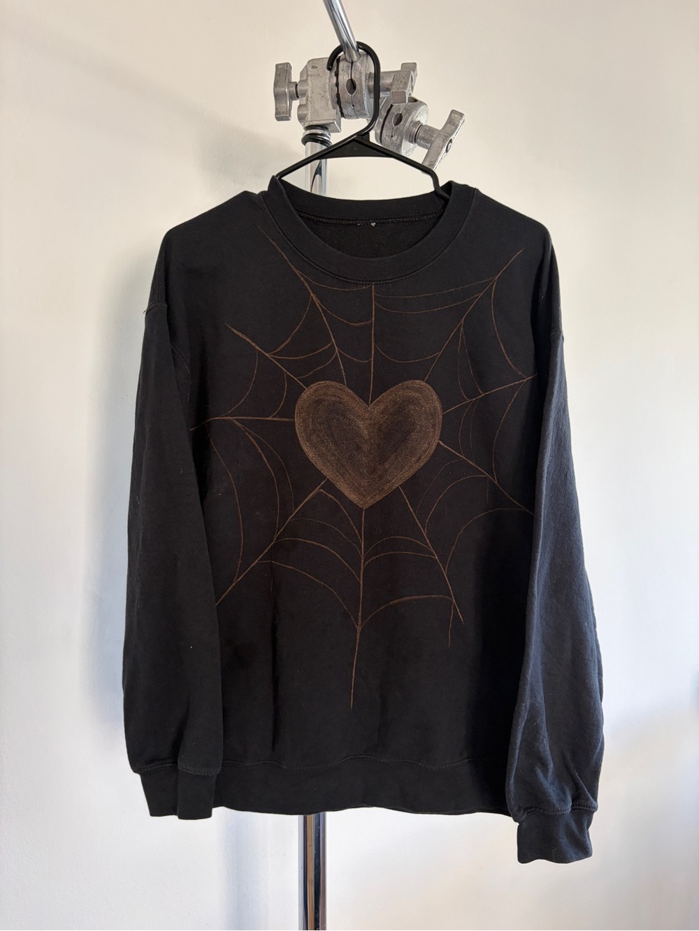 Black Crewneck Sweatshirt with Brown Heart Web Graphic